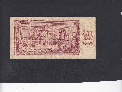 Beschrijving achterzijde: REFINERY